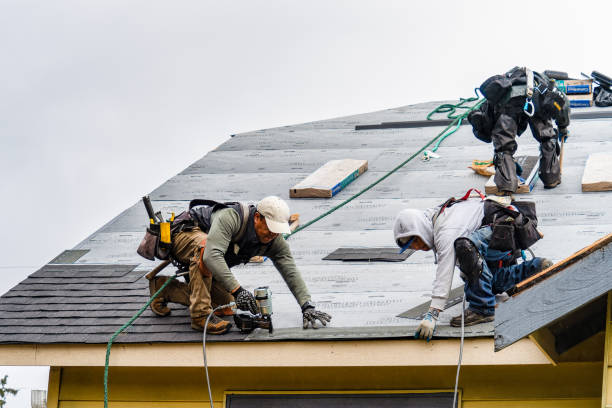 Professional Roofing technician working in Marion, KS